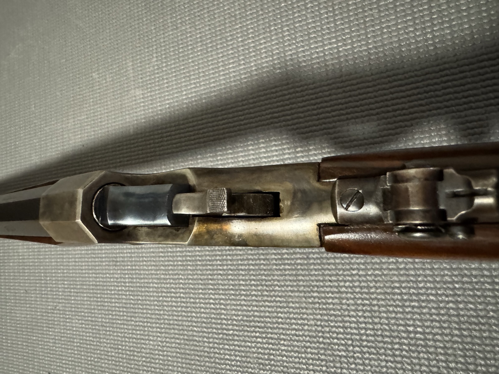 Top of the Stevens 44 action with breech open, showing surviving case-hardening colors
