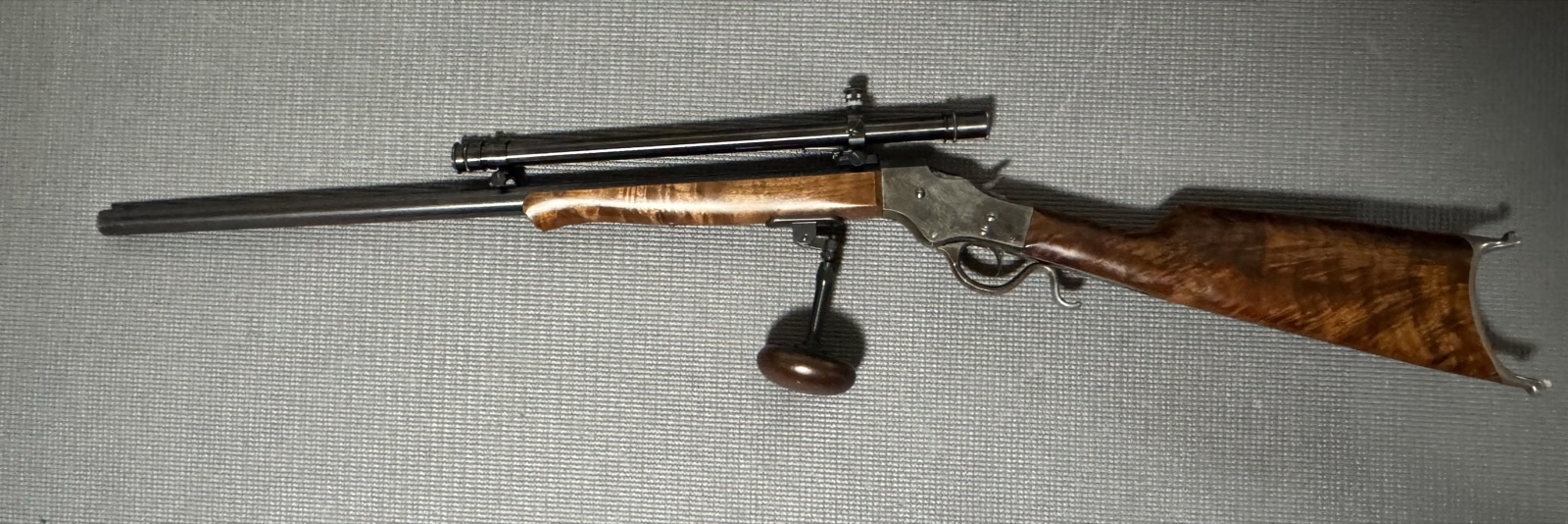 Stevens 44½ Schuetzen rifle, full length, with tube scope and palm rest